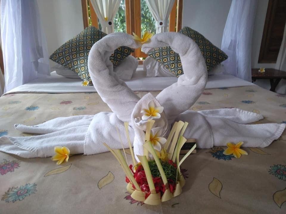 Omunity Bali Hotel Singaraja Buitenkant foto